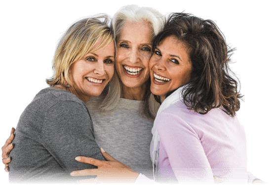 Three mature woman in a group hug